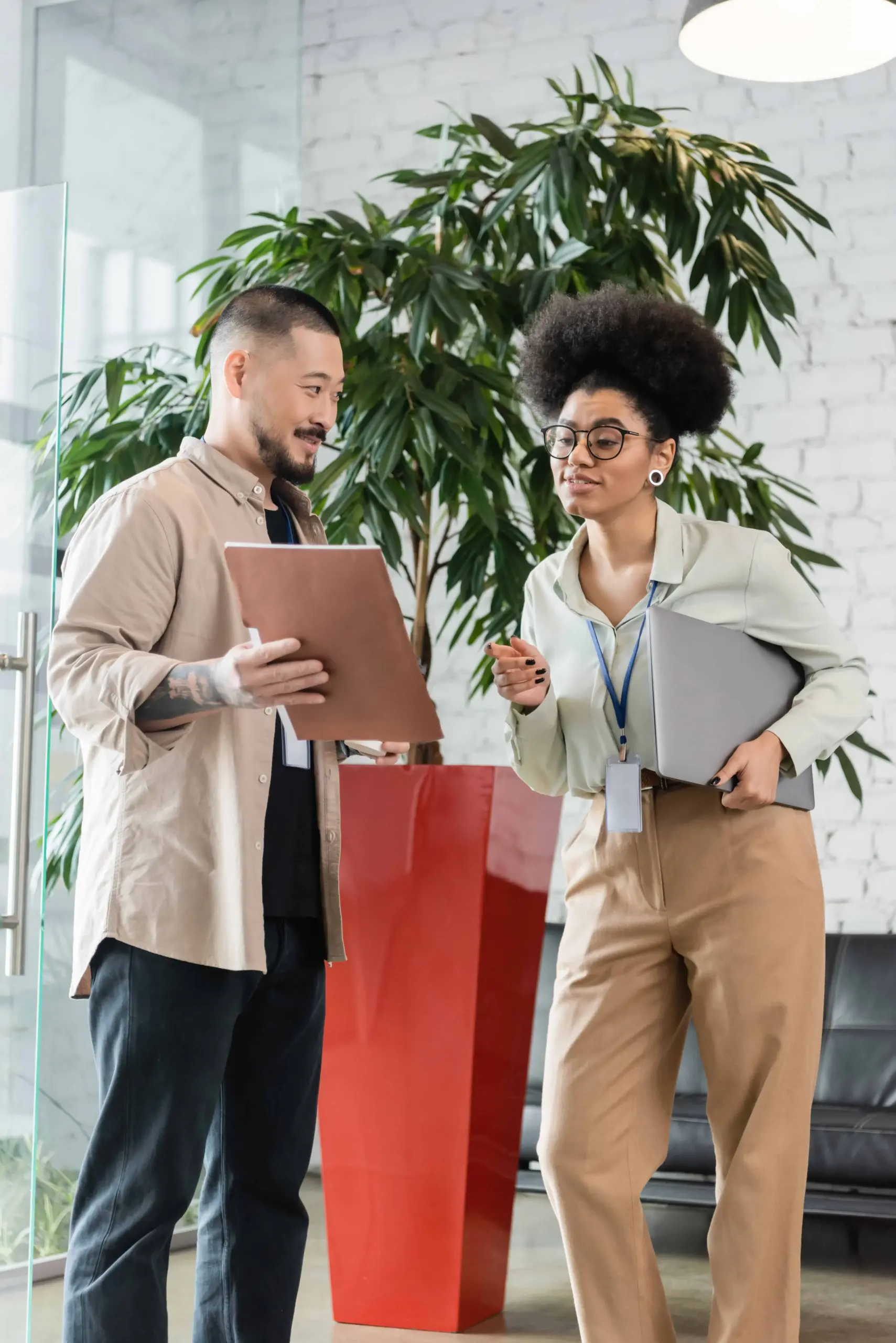 man-showing-folder-with-startup-plan-to-afri-2026-01-06-00-16-03-utc Intuit Enterprise Suite vs Acumatica ERP comparison for mid-market finance teams