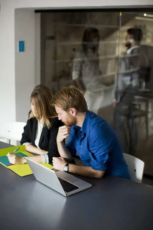 Intuit Enterprise Suite for Non-Profits implementation team reviewing fund reports